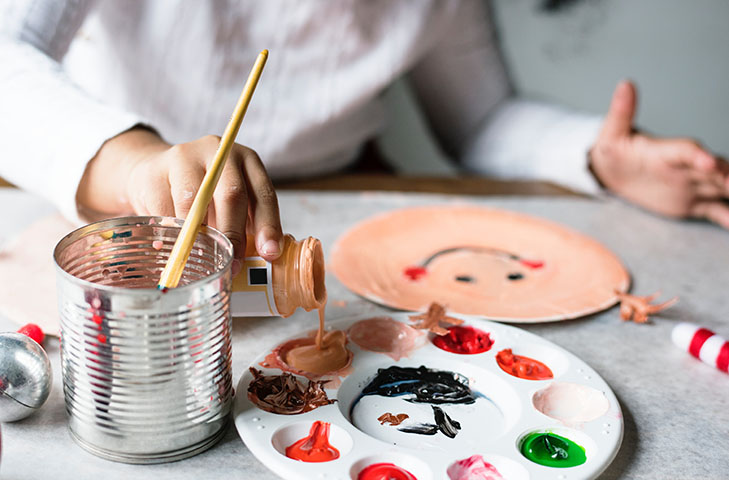 Child painting at Kindergarten